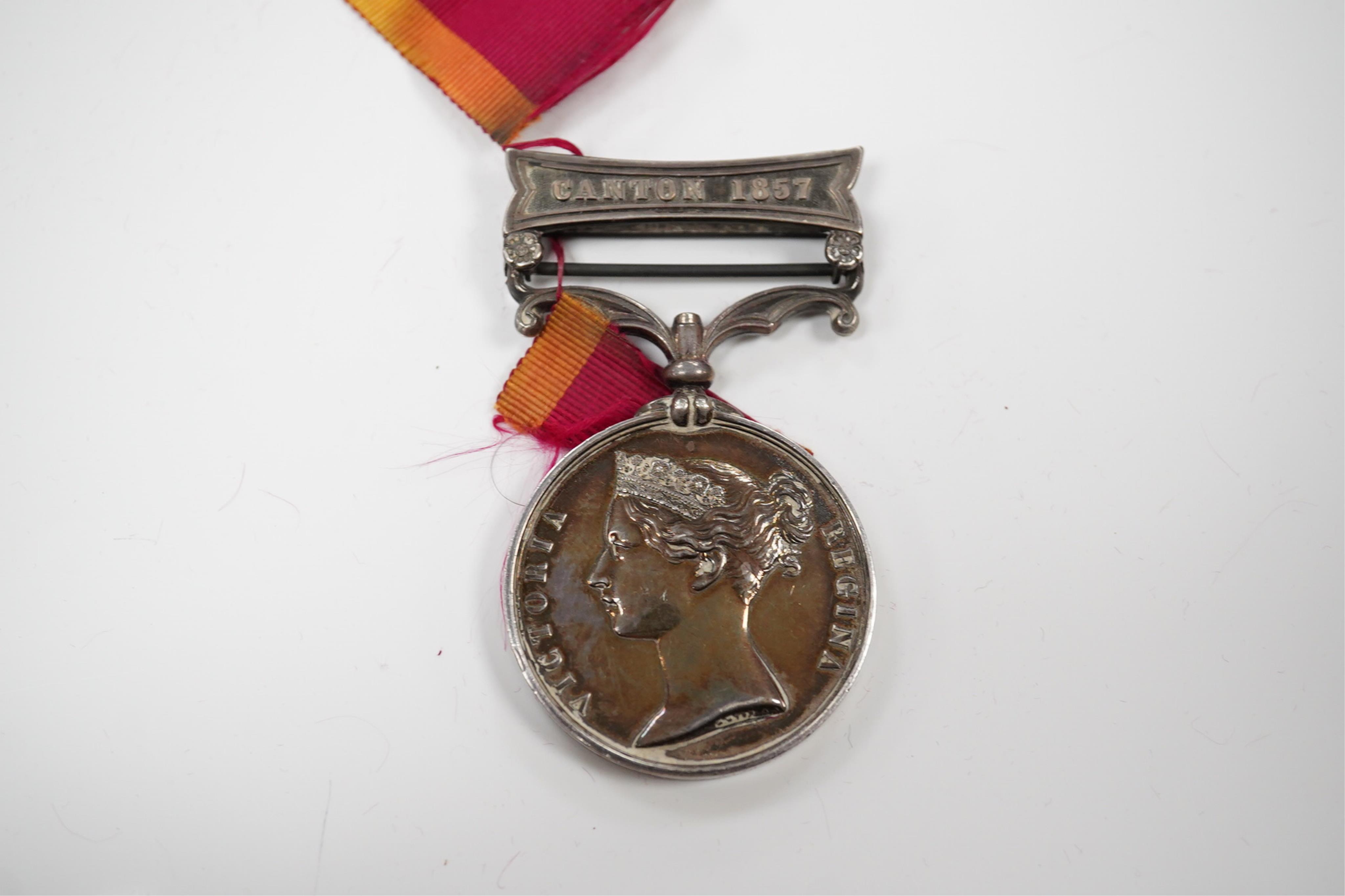 A Second China War Medal 1861 with Canton 1857 clasp, unnamed, navy issue.